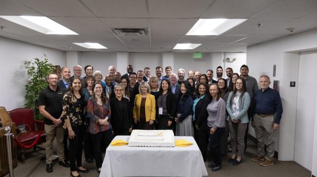 The Voice of Prophecy team gathers with their executive committee to celebrate the ministry’s upcoming 95th birthday with a delicious cake.