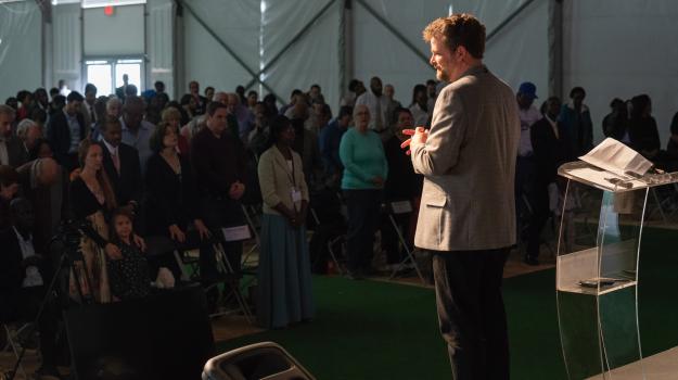 Shawn Boonstra presenting on stage at RSP Raleigh. 2019.