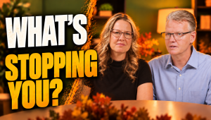 Ken and Julie Norton seated at a table beside the words “What’s stopping you?”